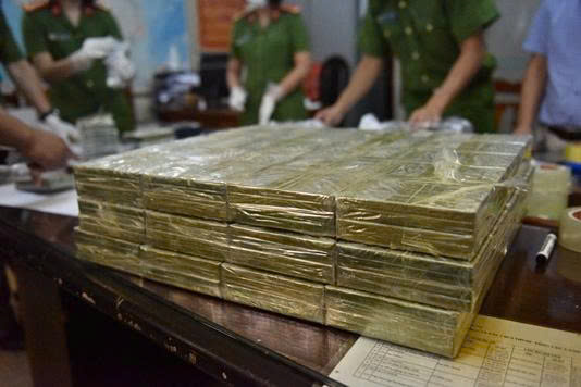 Khởi tố 73 đối tượng trong đường dây mua bán, vận chuyển hơn 27 bánh heroin- Ảnh 1.