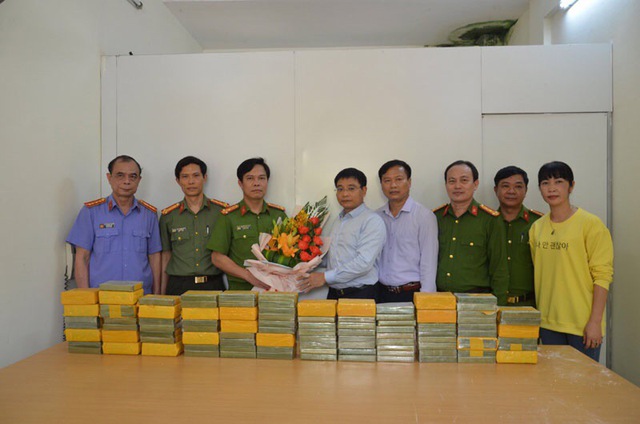 Bốn đối tượng vận chuyển 115 bánh heroin từ Lào về Việt Nam - Ảnh 1.