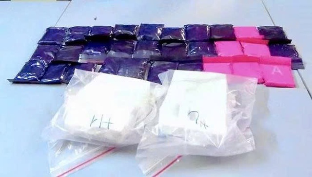 Triệt phá đường dây ma túy xuyên biên giới, thu giữ súng và hơn 34kg ma túy- Ảnh 2.