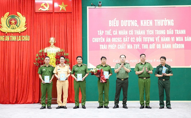 Bắt 2 đối tượng mua bán 8 bánh heroin ở Lai Châu - Ảnh 2.